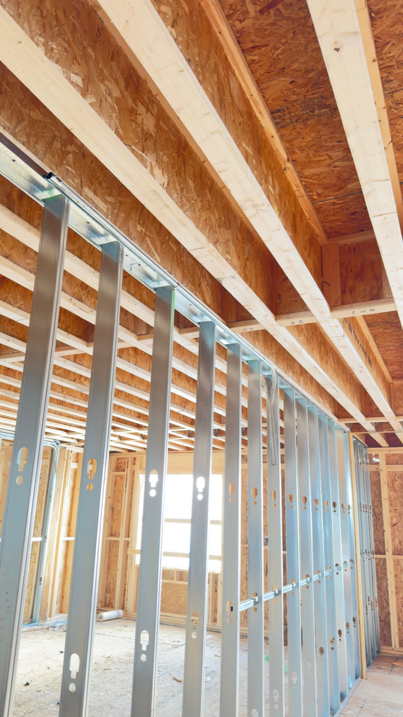 Steel stud partition framing on a hotel guest floor before board