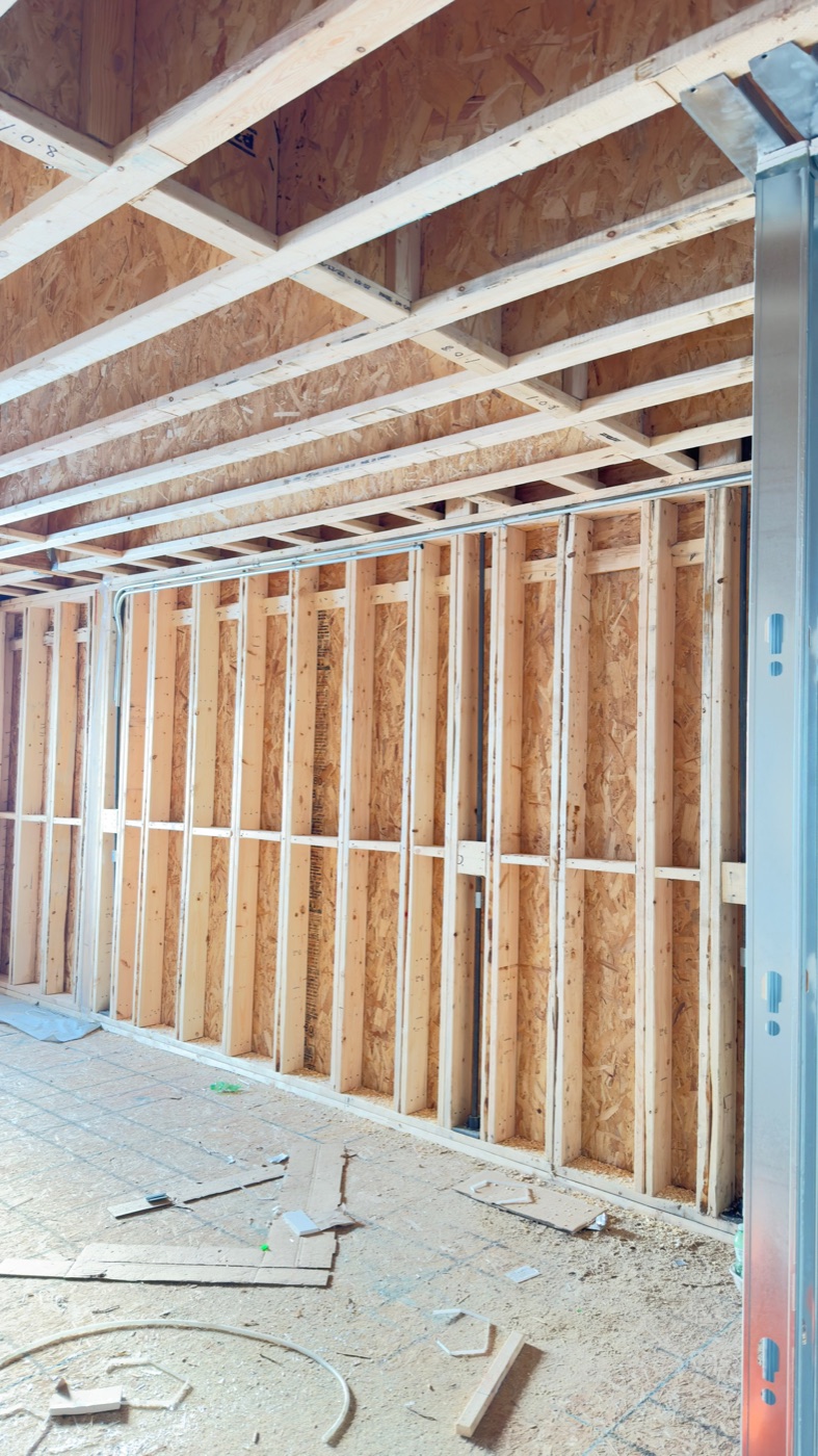 Steel stud partitions framed to layout on a hotel floor in Prescott, Ontario