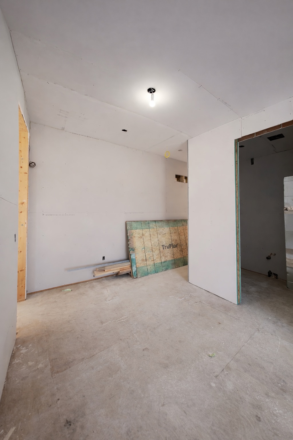 Commercial tenant fit-out drywall boarded and ready for taping in Midtown Toronto