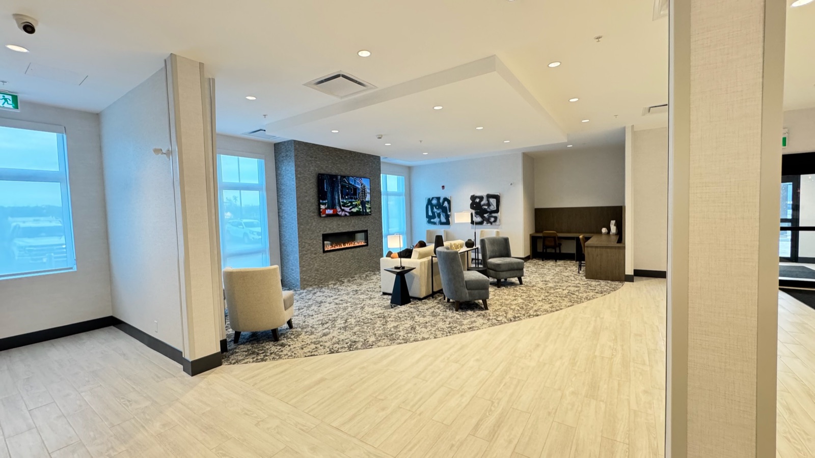 Finished Toronto hotel lobby with completed commercial walls and ceilings